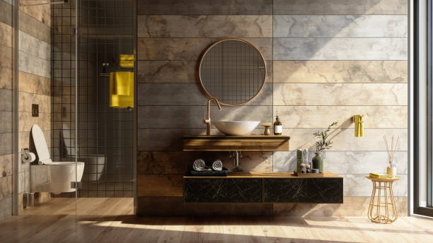 baño con espejo redondo de marco dorado